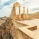 The Acropolis of Lindos sitting atop a cliff overlooking the sea in Rhodes, Greece